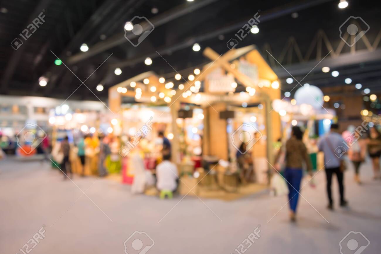 Abstract Blurred People In Trade Show Expo Background Usage Stock