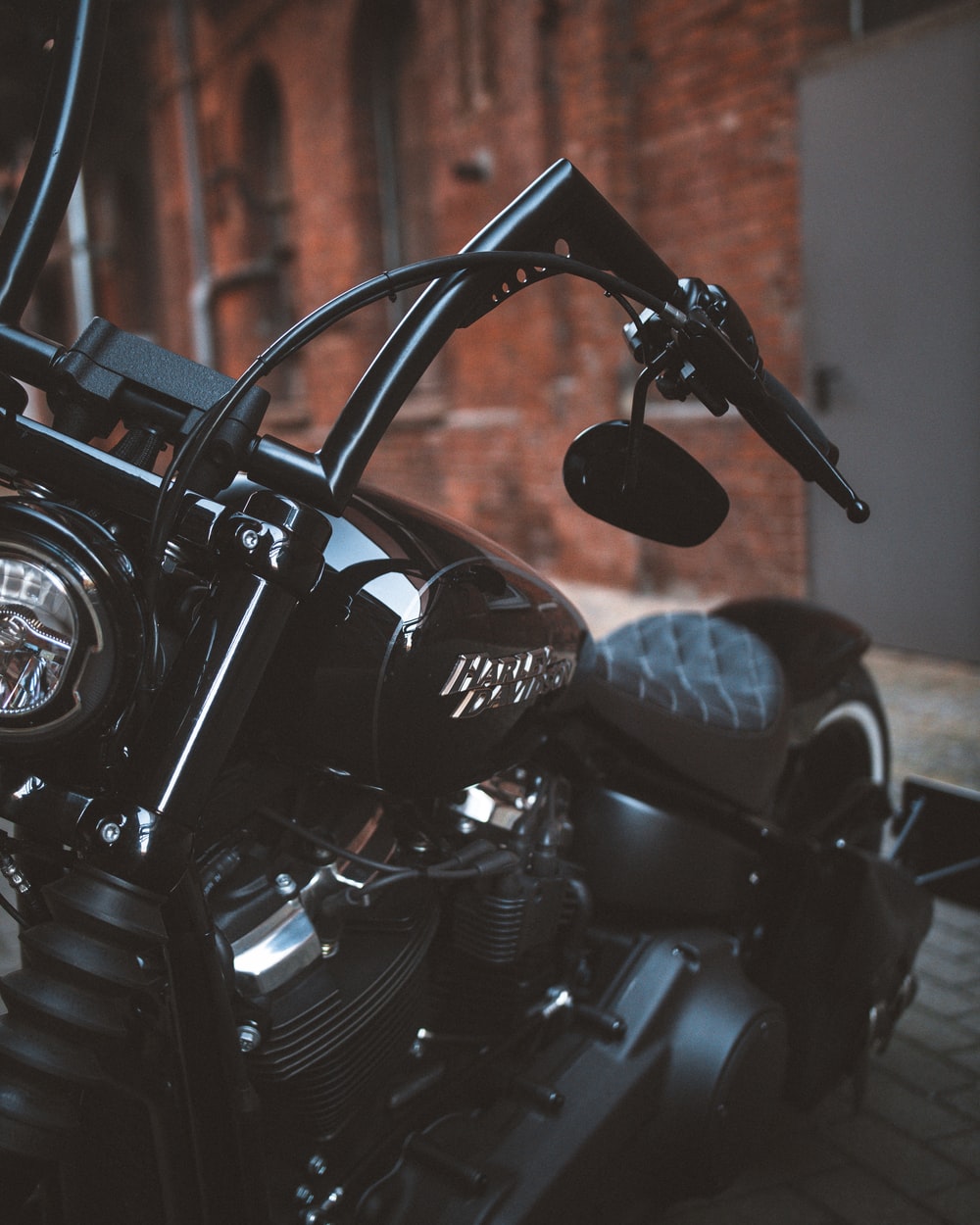 Black Motorcycle Near Brown Wall Photo Harley Davidson