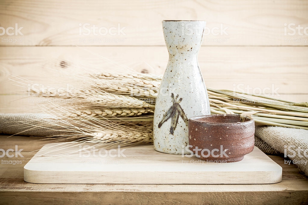 Japanese Sake Drinking Set On Wood Texture Background Stock Photo