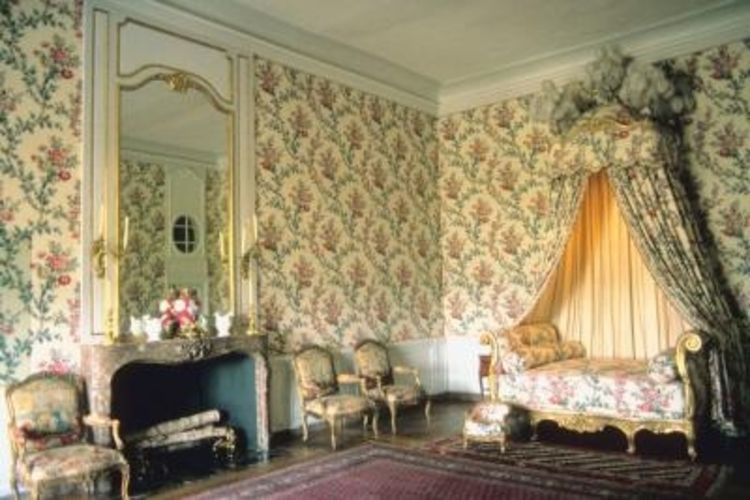 On French Country Bedroom Uses Toile For Wallpaper And A Crown