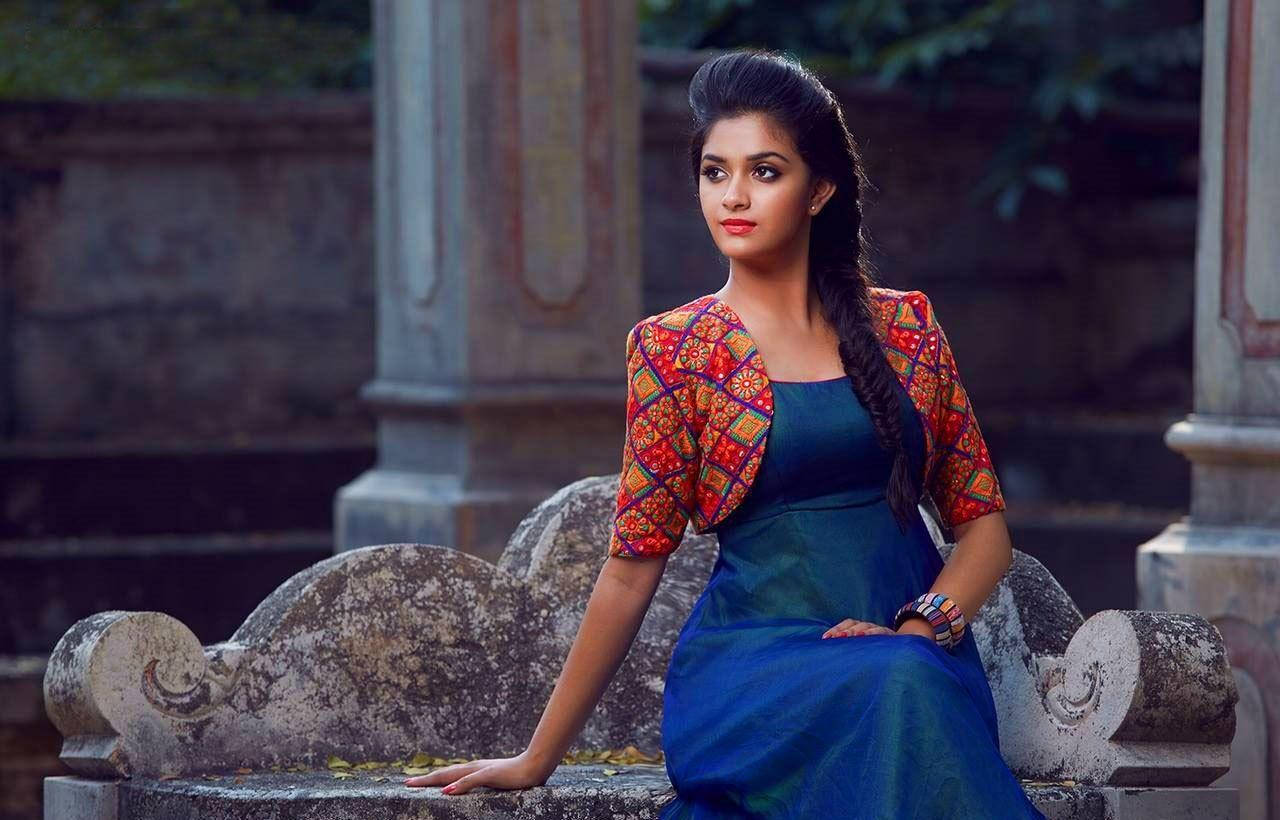 Keerthi Suresh On Stone Bench HD 8x5g5jpu2hs8vkb3 Wallpaper