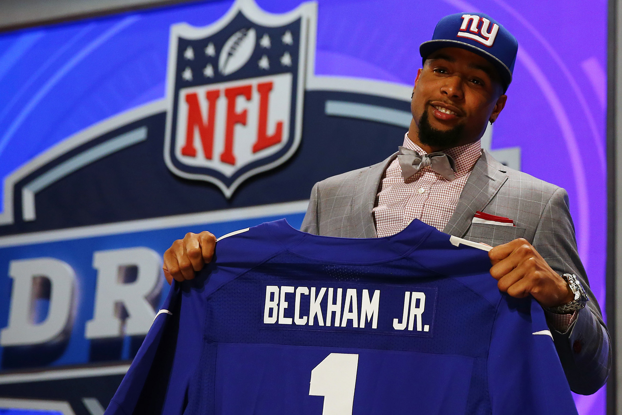 Odell Beckham Jr Of The Lsu Tigers Poses With A Jersey After He Was
