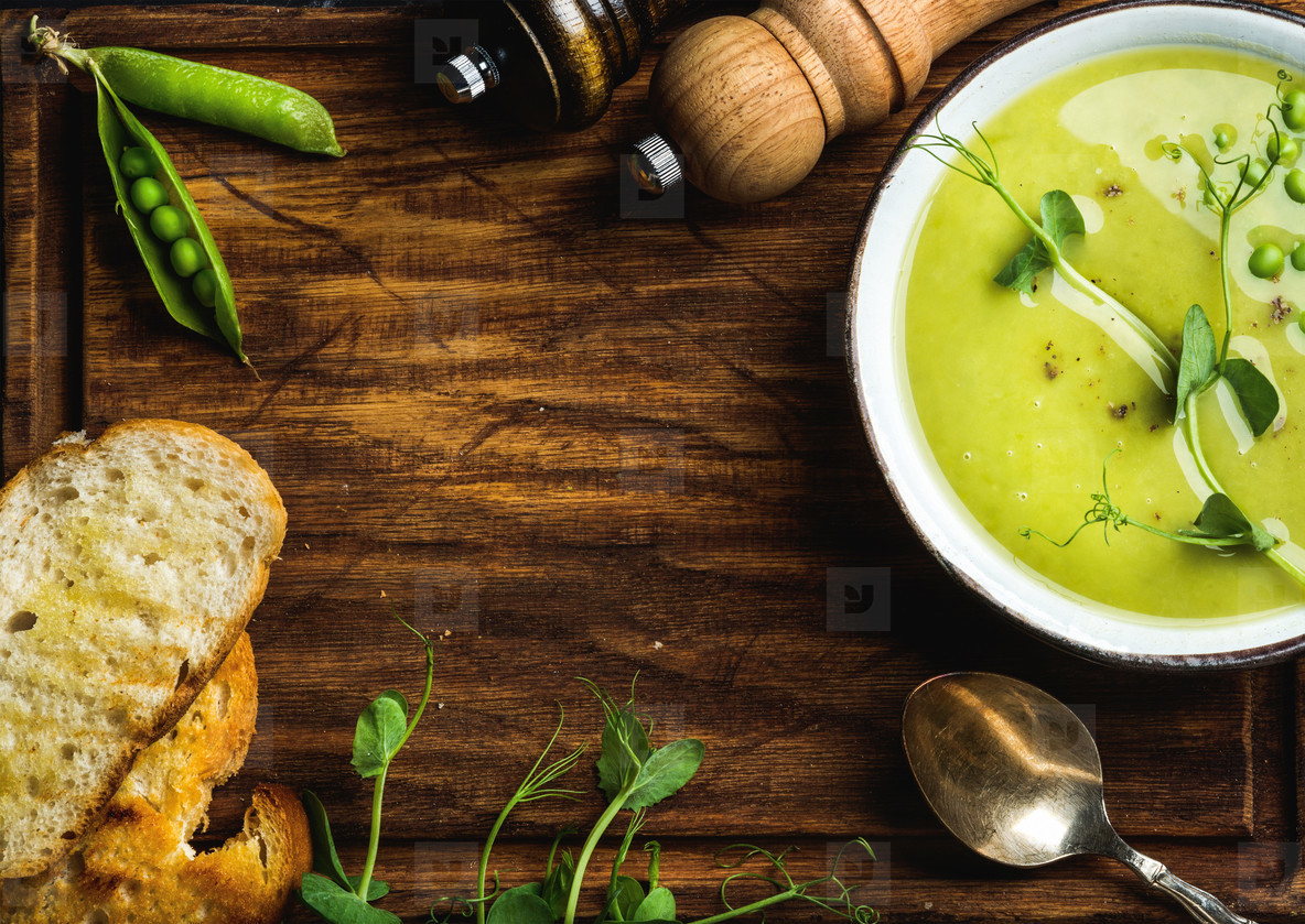 Photos Green Pea Cream Soup On Wooden Background Copy Space