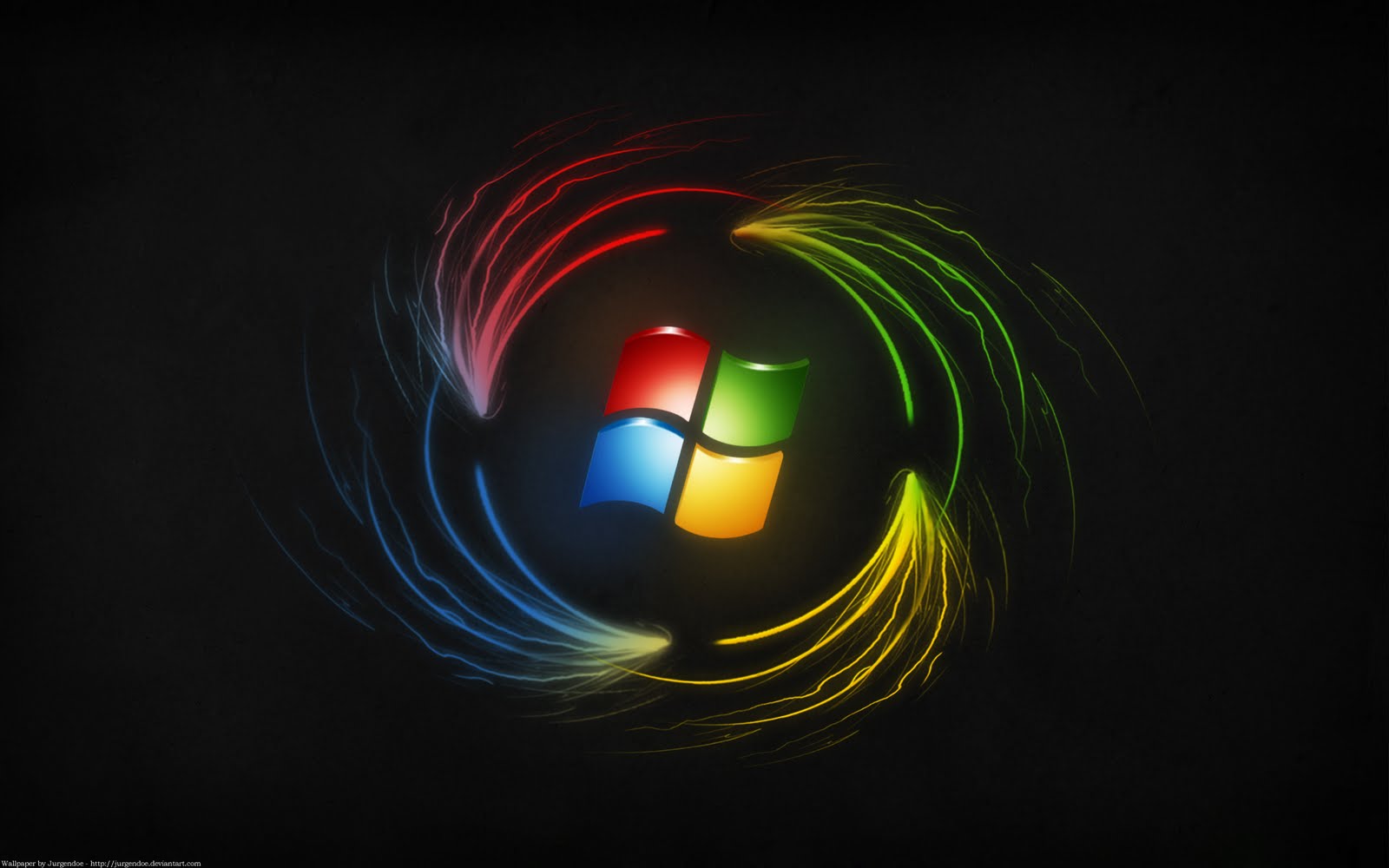 A vibrant Windows logo, surrounded by swirling streaks of red, blue, green, and yellow light, against a dark background. This wallpaper embodies the dynamic energy of the Windows operating system