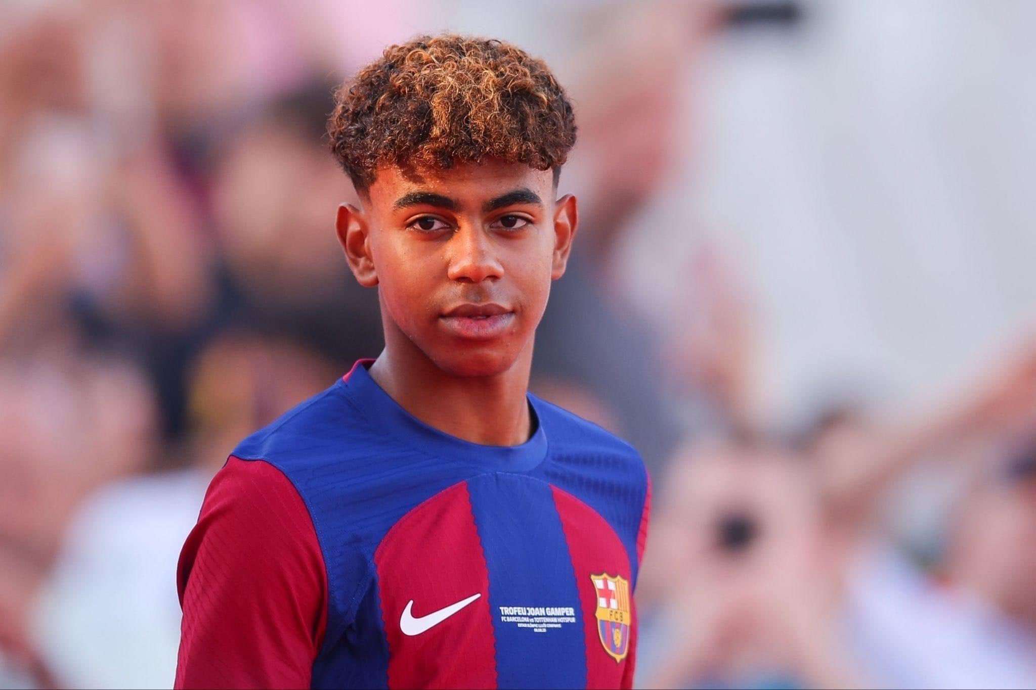 Lamine Yamal in a Barcelona jersey, close-up shot