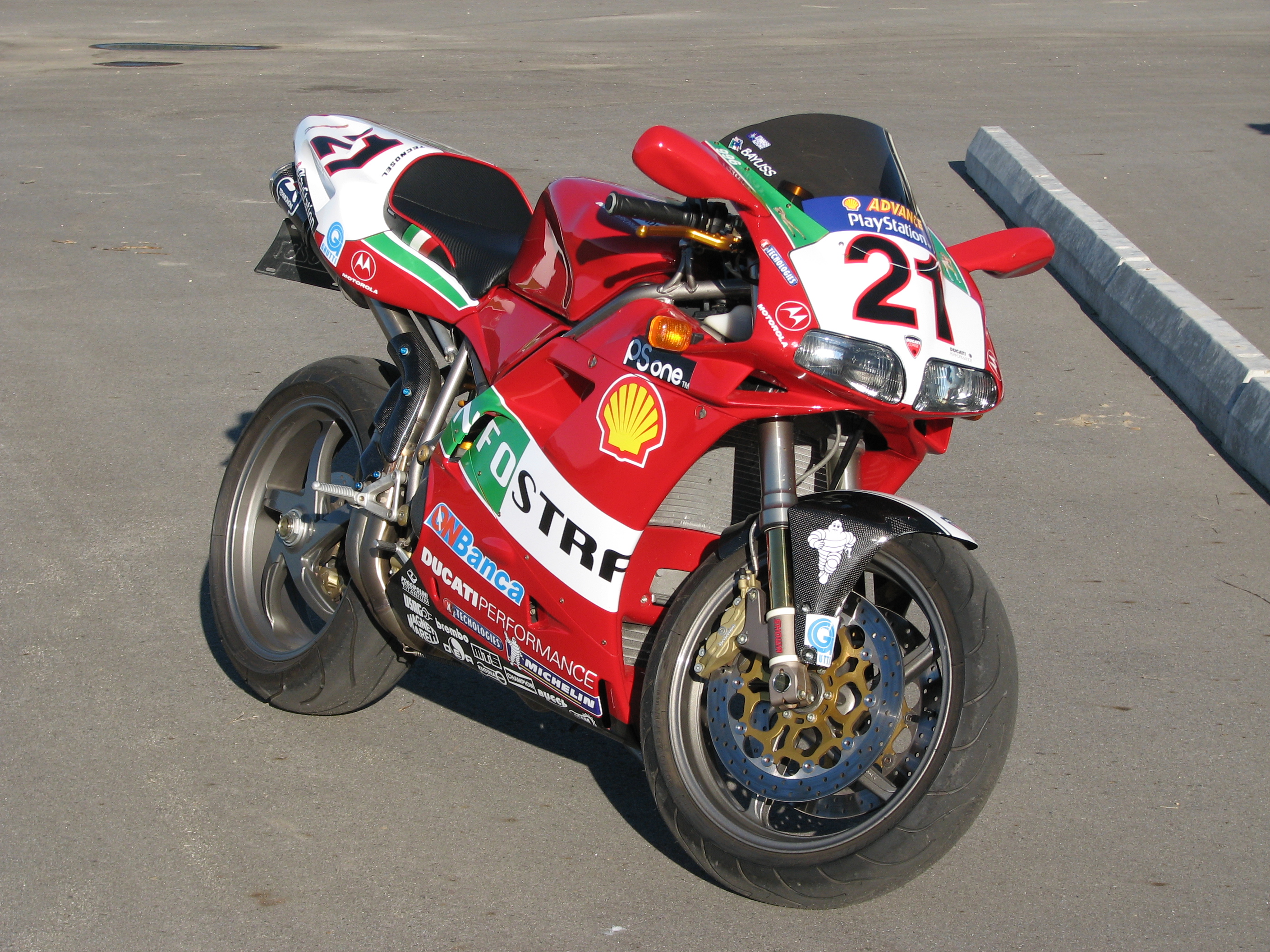 Red Ducati 996 Motorcycle Parked on Asphalt