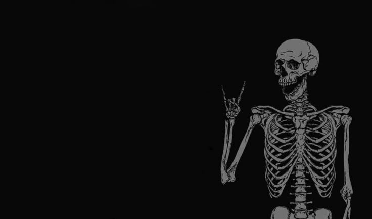 A Skeleton Holding Knife In The Dark Wallpaper