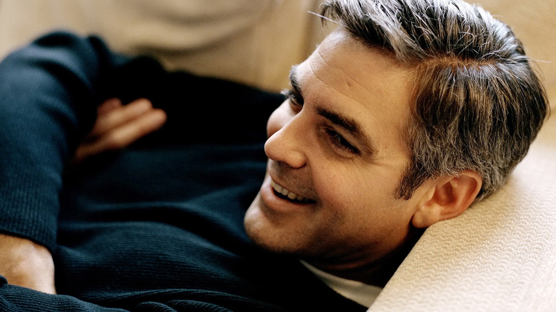 sweater smiling lying down george clooney actor Wallpapers
