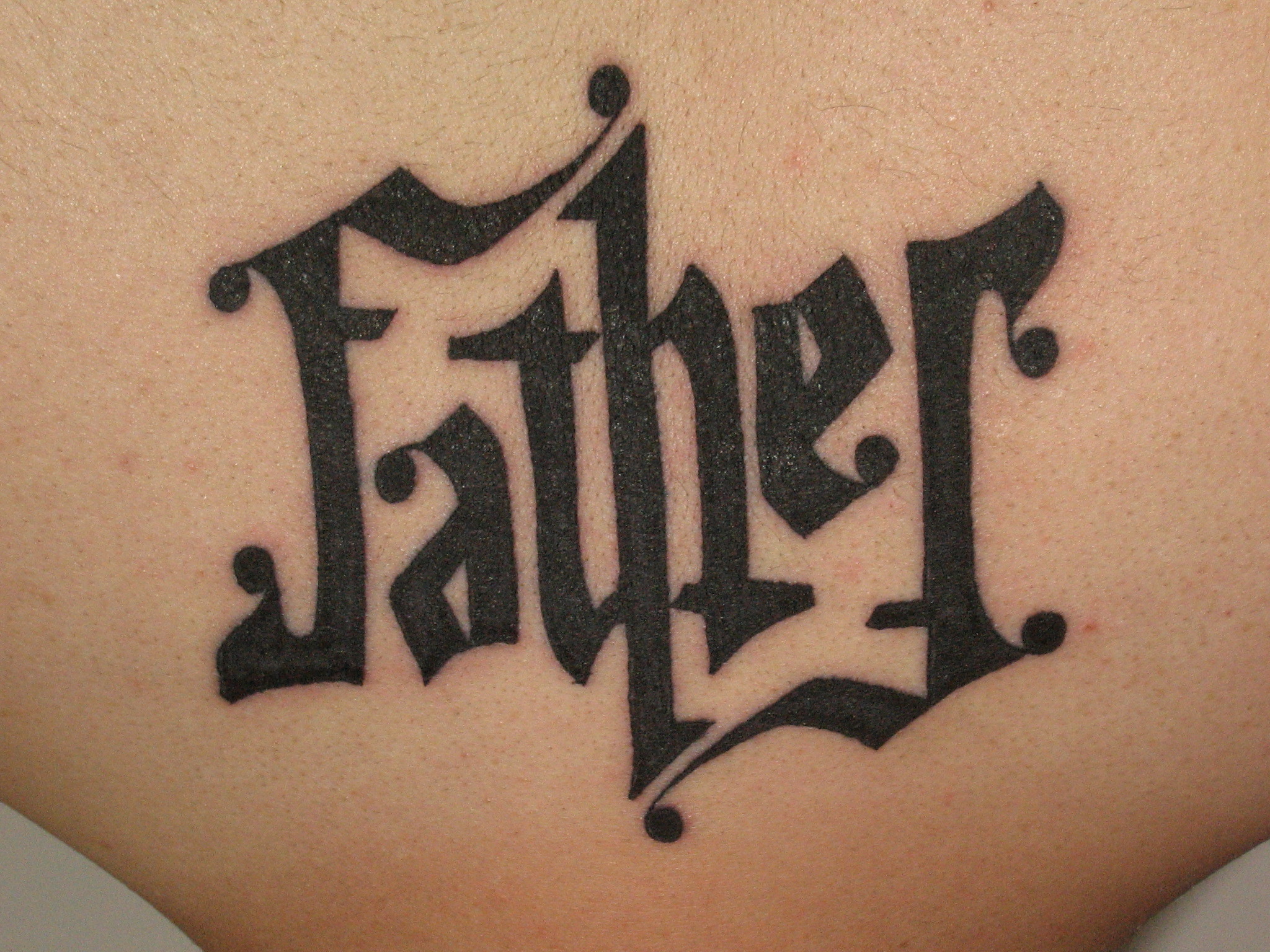 Black Ink Father Ambigram Tattoo Tattooshunt