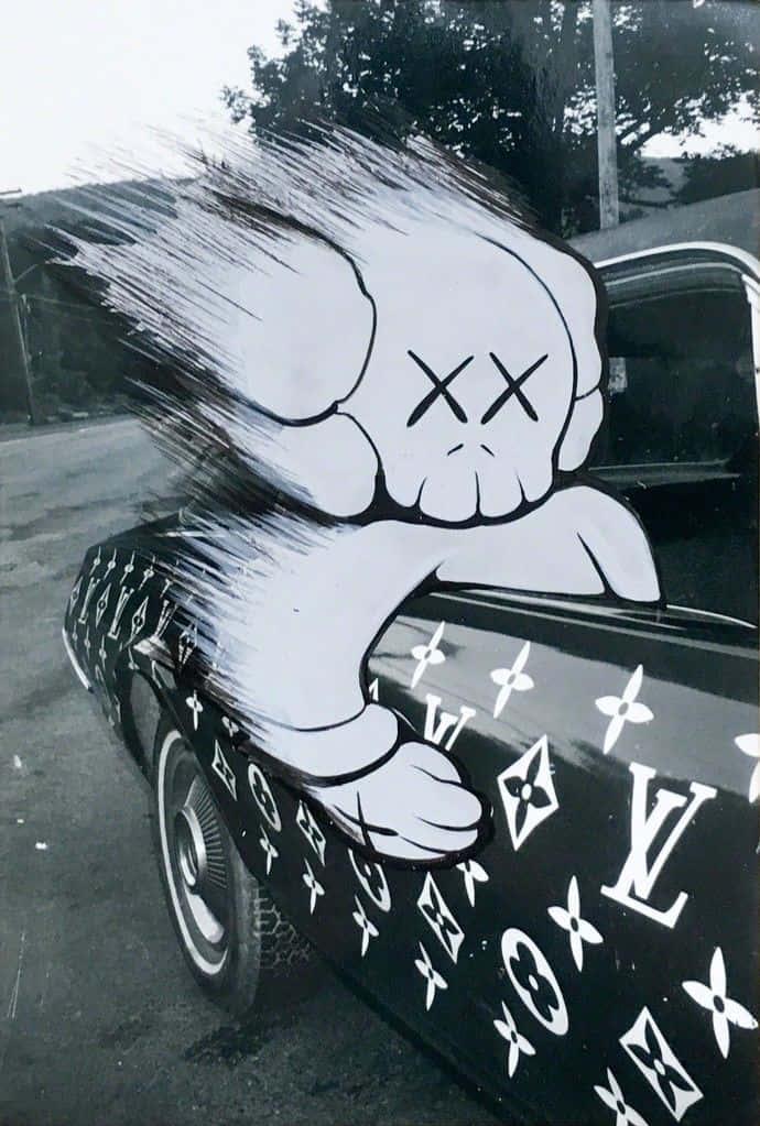 A Black And White Photo Of Car With Graffiti On It