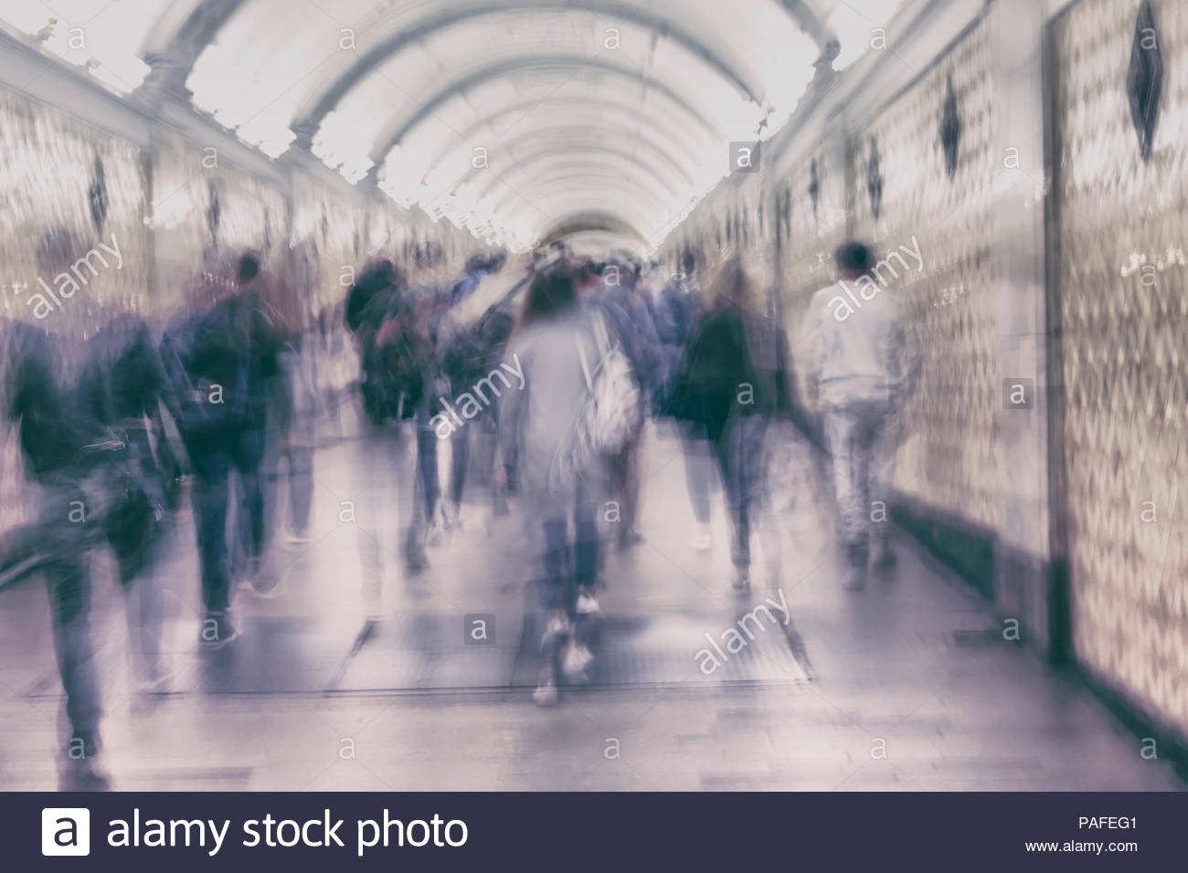 Unrecognizable Group Of Walking People In Subway Station Blurred