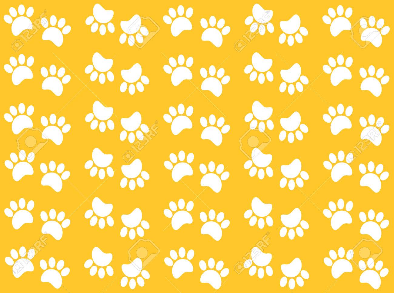 White Paw Prints Pattern On A Yellow Background Stock Photo