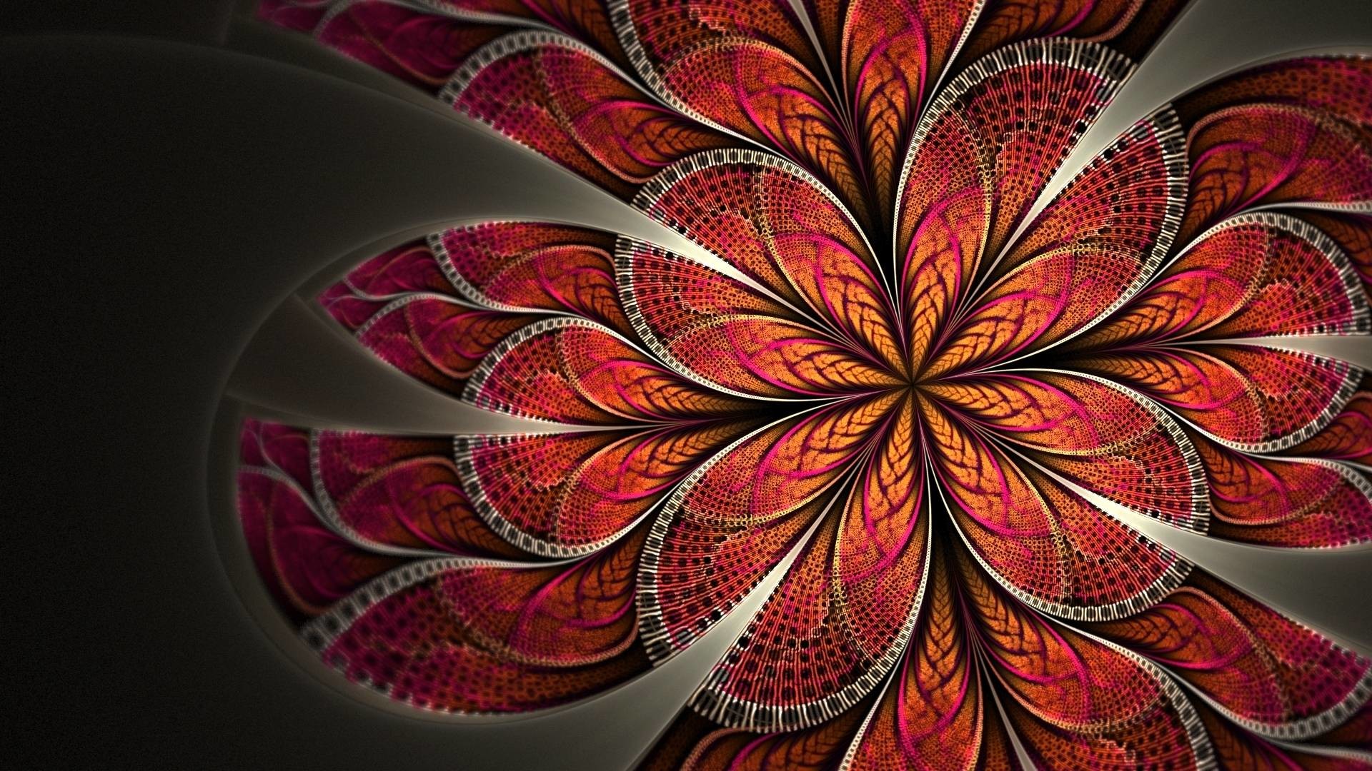 Intricate fractal design resembling a stylized flower in shades of orange, red, and white against a dark background