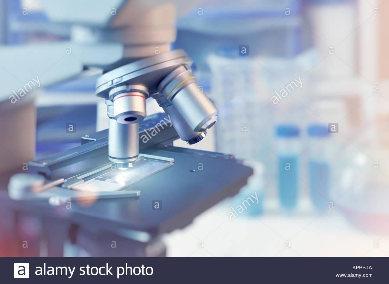 Scientific Background With Closeup On Light Microscope And