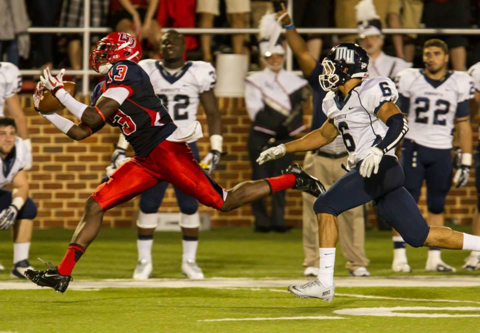 Liberty University Football Team Plays Against Monmouth