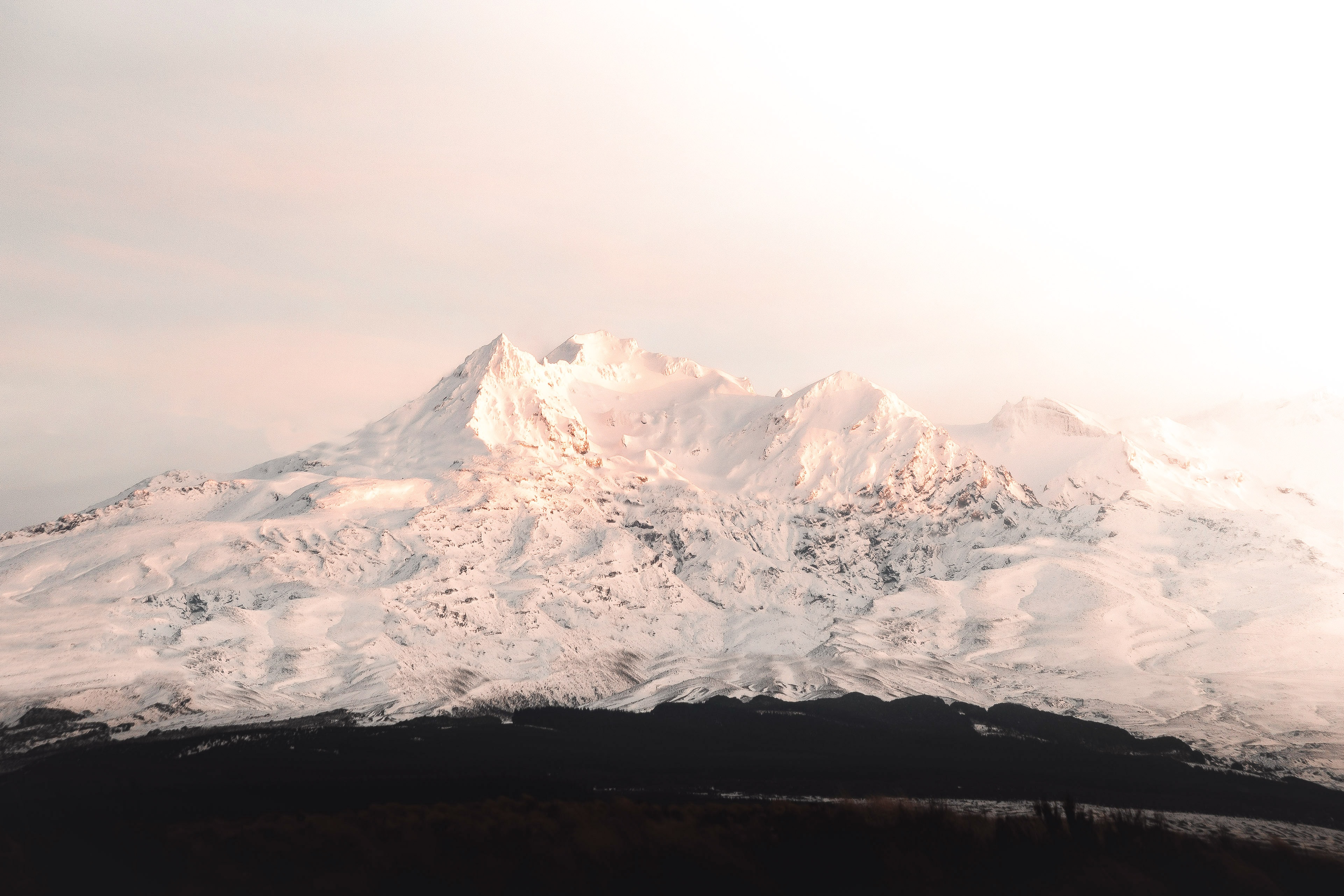 Majestic snow-capped mountain range at sunset in 4k resolution