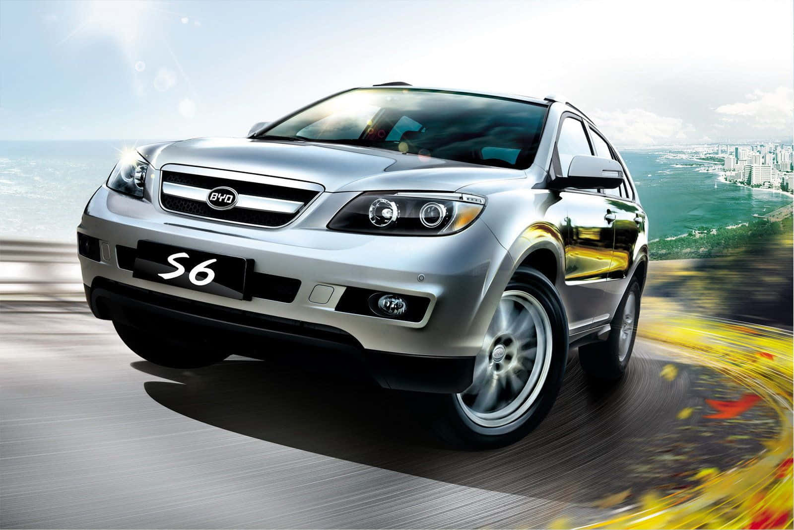 BYD S6 SUV in motion against a coastal backdrop