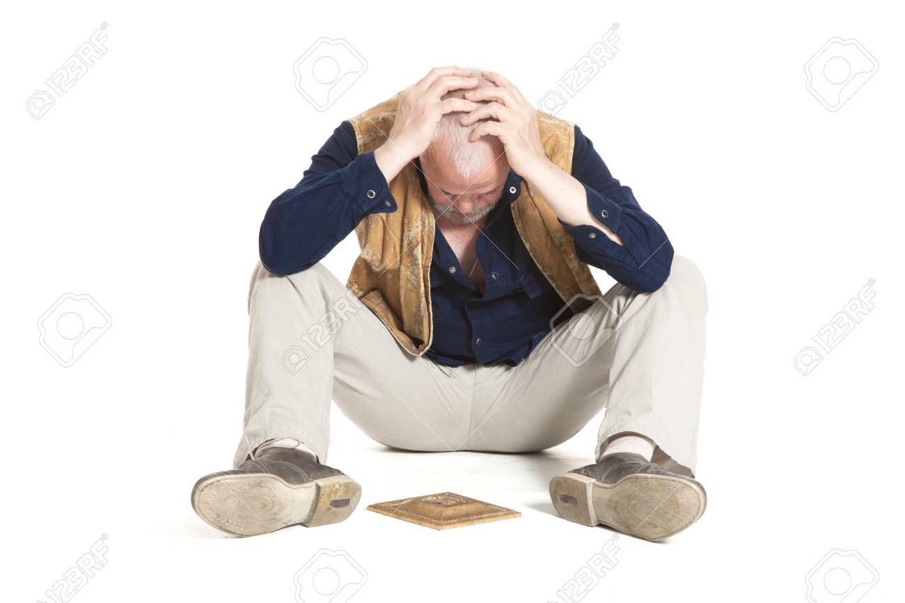 Man Sits On The Floor With Gilded Fretwork White Background