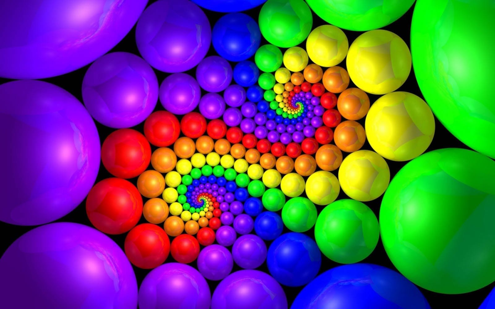 A vibrant spiral of colorful spheres, reminiscent of a dynamic live wallpaper
