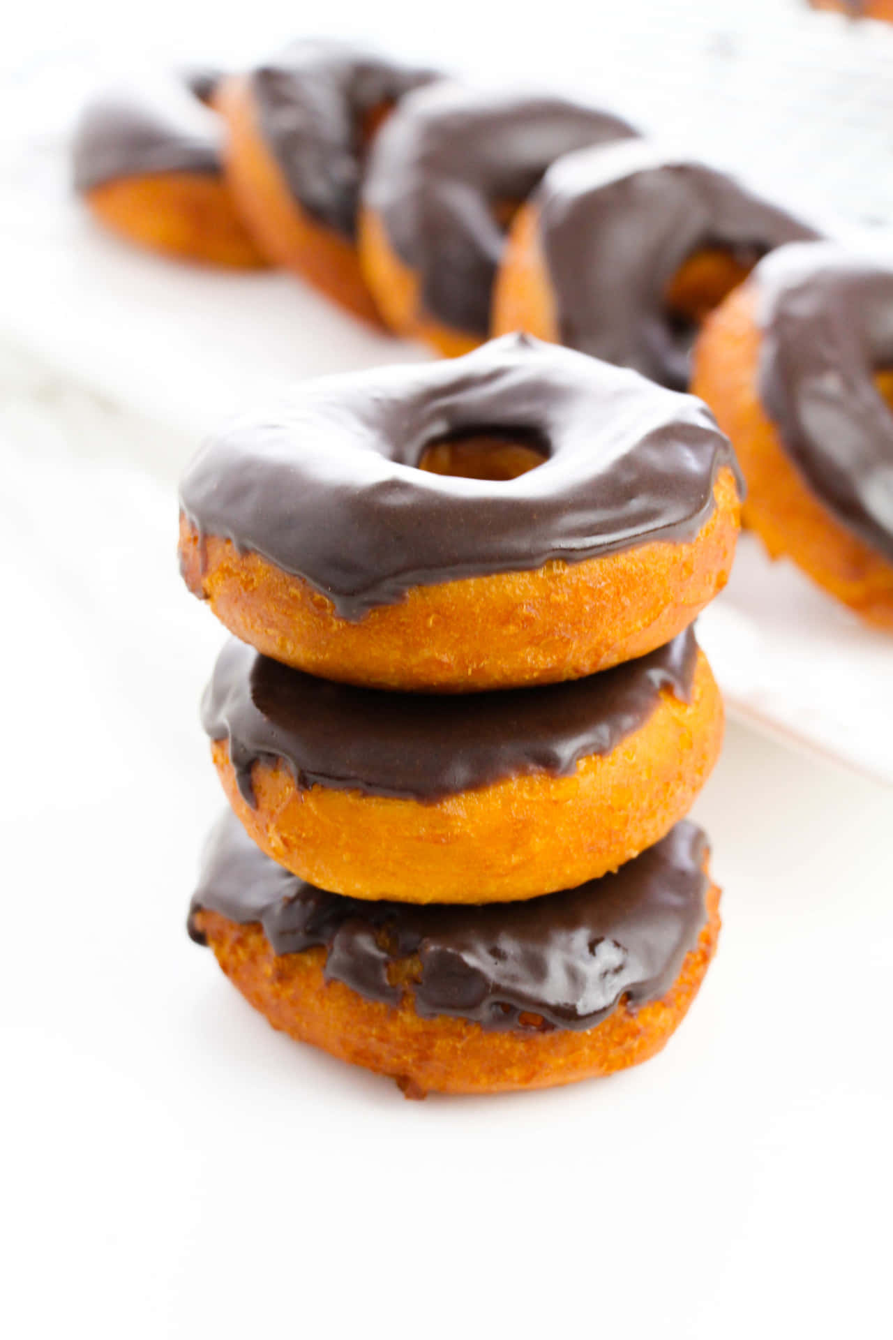 Enjoy A Delicious Glazed Donut Any Time Of The Day Wallpaper