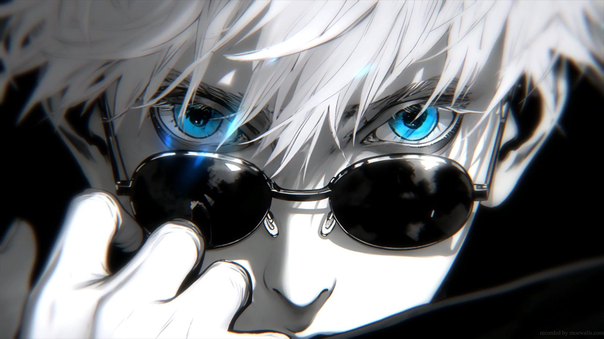 Close-up of Gojo Satoru with his signature sunglasses, highlighting his vibrant blue eyes and white hair