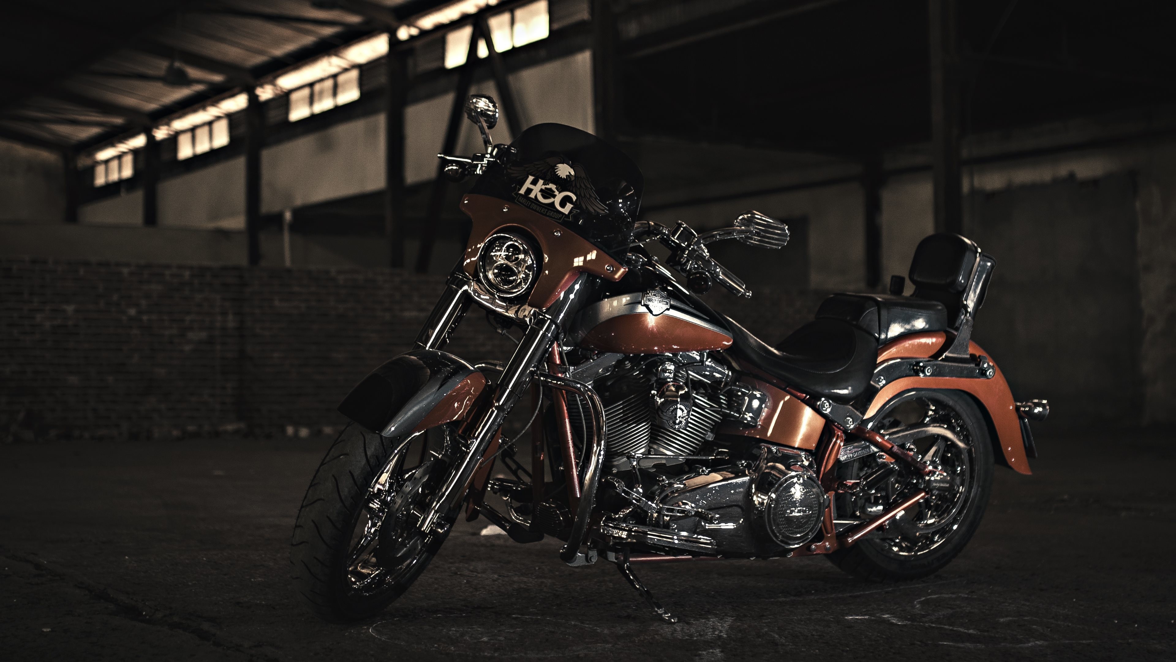 A Customized Harley-Davidson Motorcycle in a Dimly Lit Industrial Setting