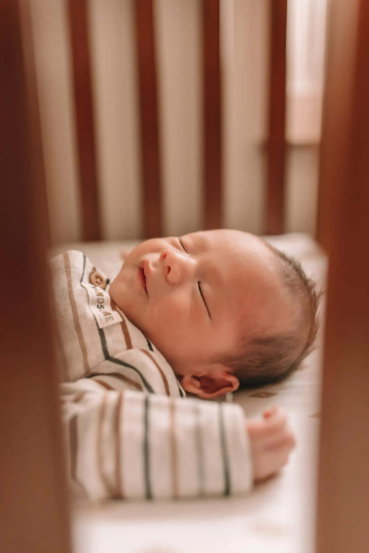 Newborn Baby Sleeping In Crib Picture Wallpaper