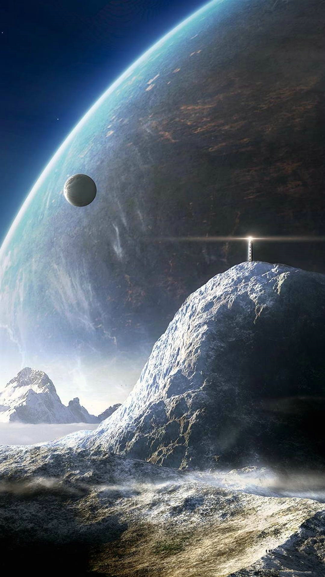 A breathtaking phone wallpaper depicting a snow-capped mountain range on an alien planet, with a glowing beacon atop the highest peak and a large, Earth-like planet visible in the sky
