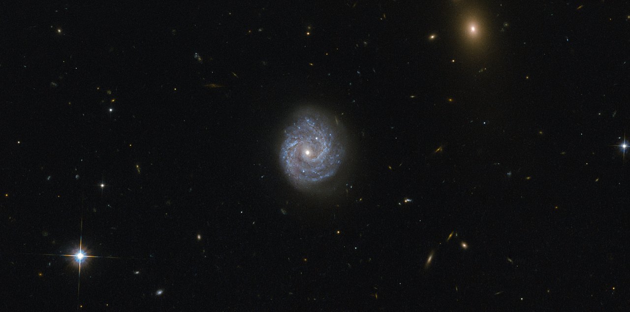 A Black Hole Of Puzzling Lightness Esa Hubble