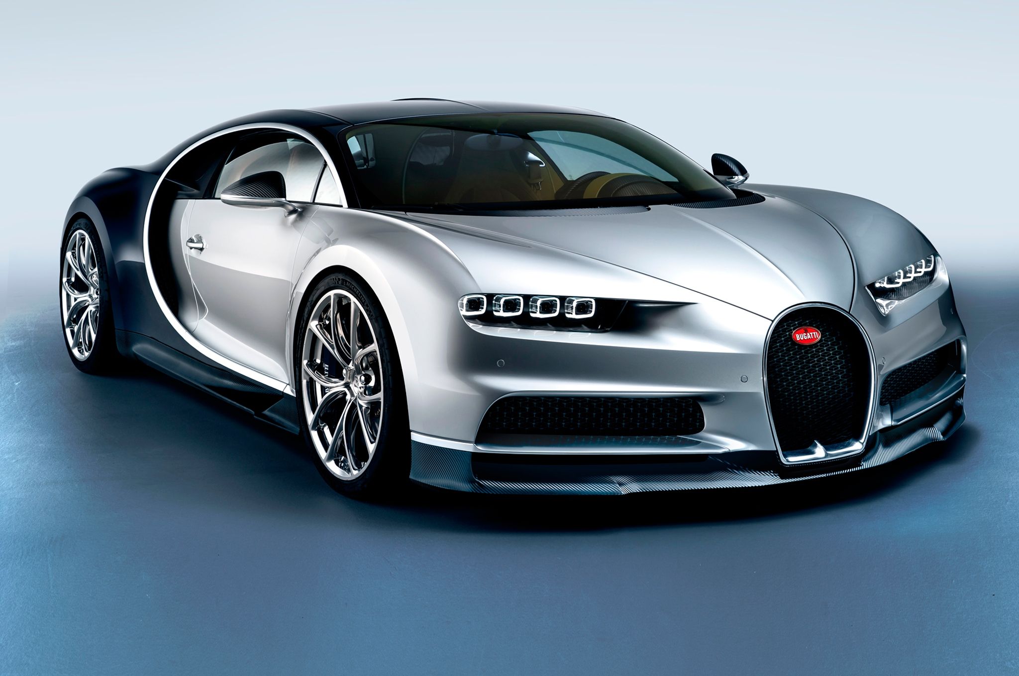 Silver Bugatti Chiron Supercar on a Blue Background