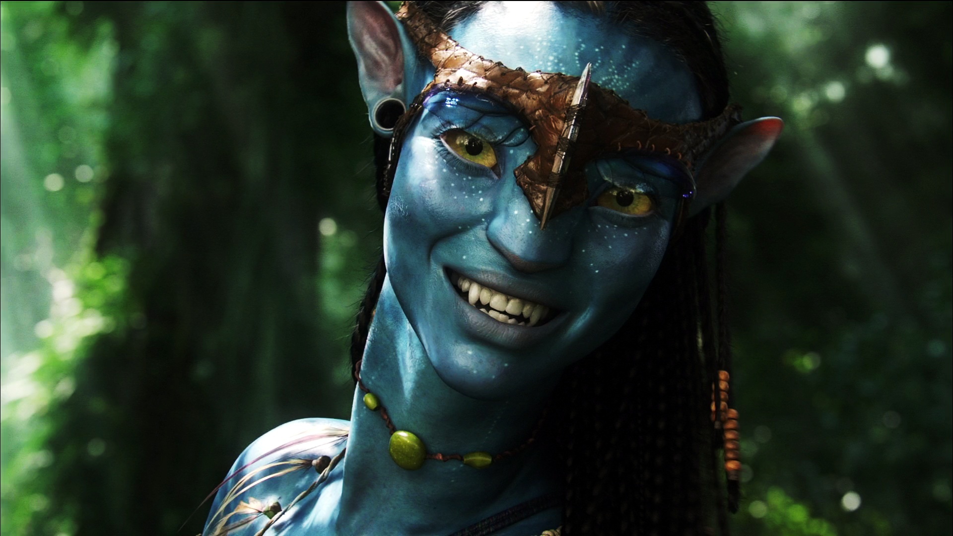 Close-up of a Na'vi character from Avatar, showcasing their blue skin, yellow eyes, and unique facial features