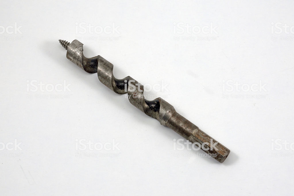 Drill Bit Used To Bore Holes With White Background Stock