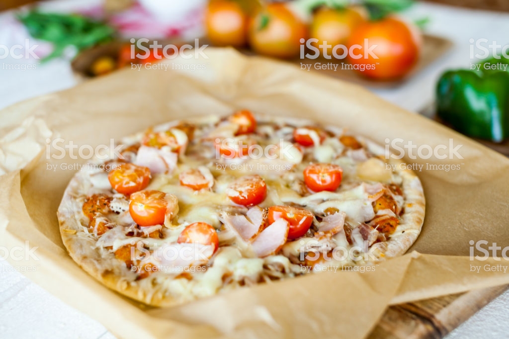 Hot Fresh Homemade Traditional Italian Pizza On Wooden Table