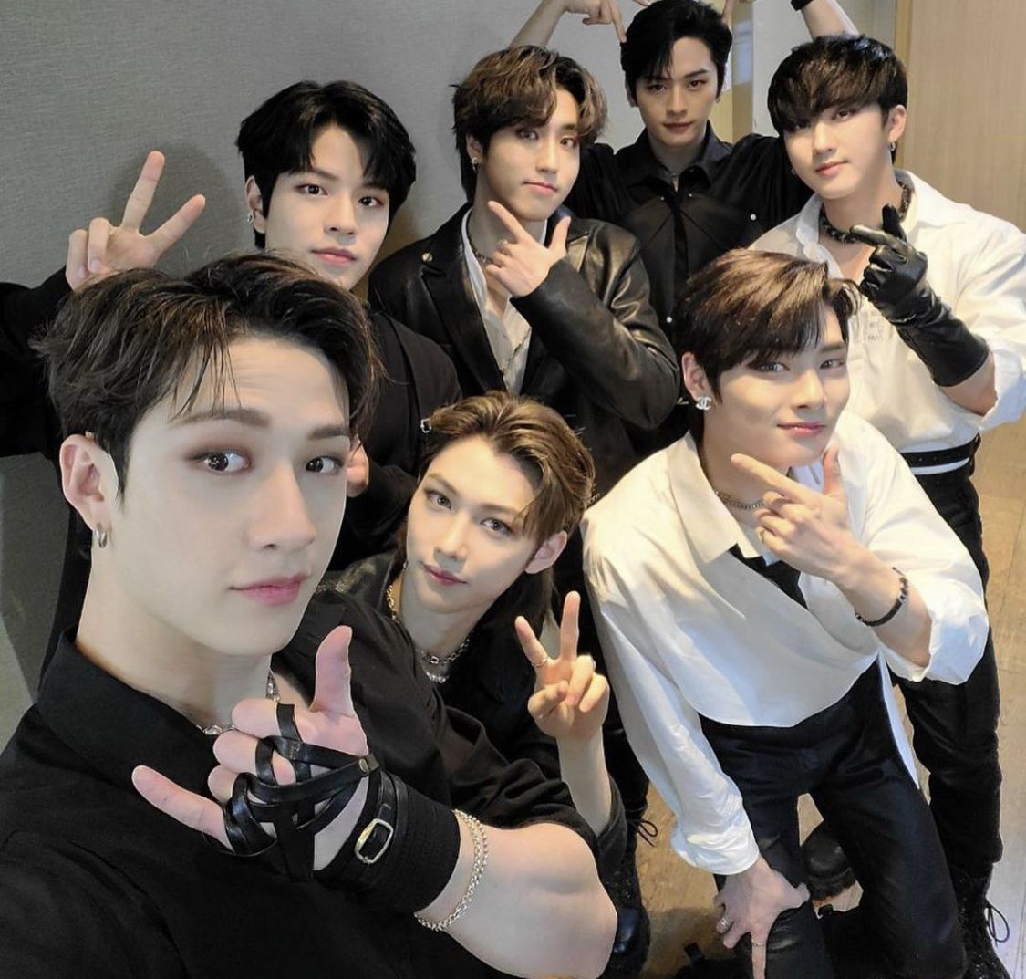 A group photo of the South Korean boy band Stray Kids posing together