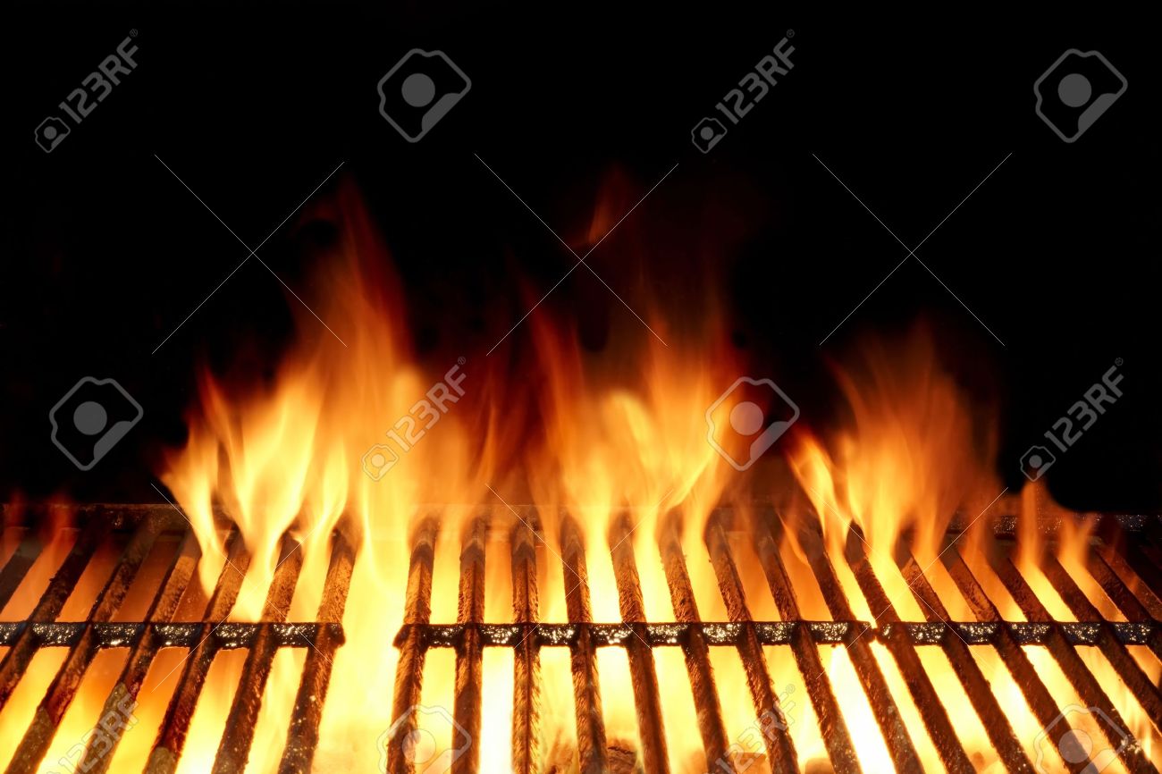 Empty Flaming Charcoal Grill With Flames Of Fire On Black