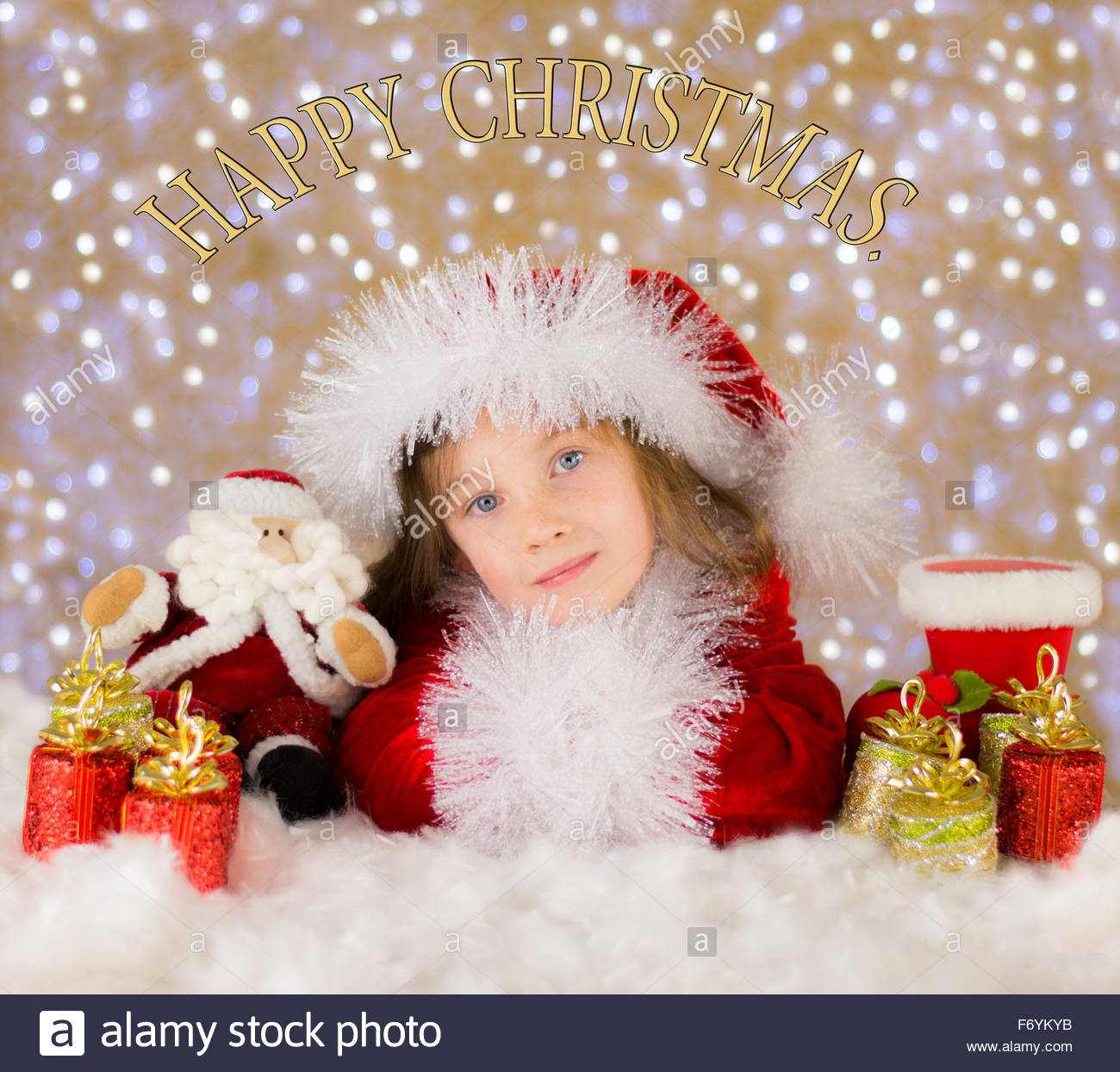 Happy Pretty Child In A Christmas Scene With Bokeh Background