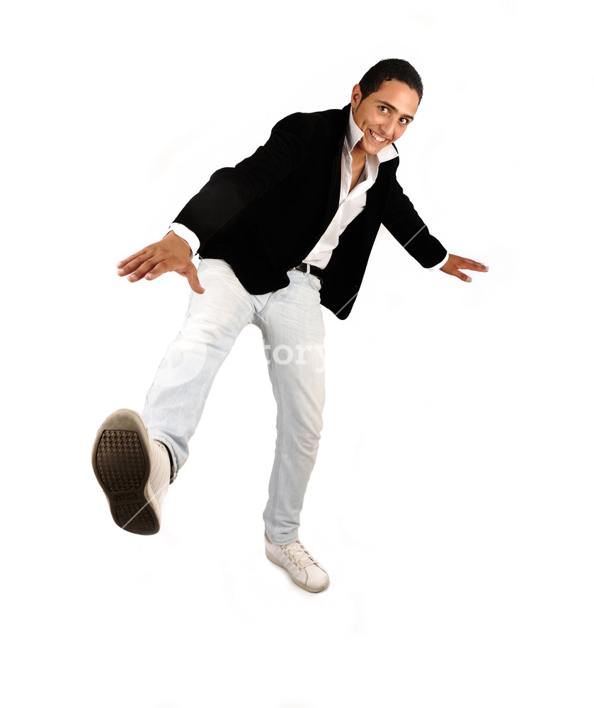 Young casual man full body over white background Royalty Free