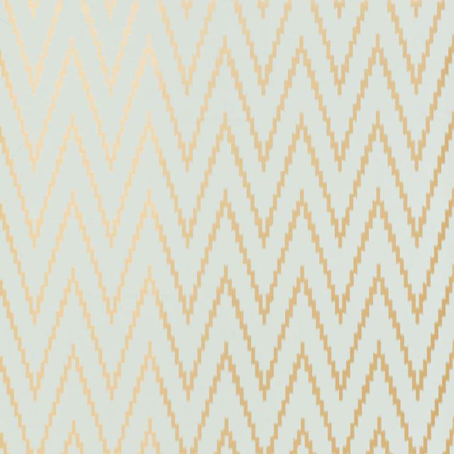 Metallic Gold Chevron Pattern Set Against An Aquamarine Background