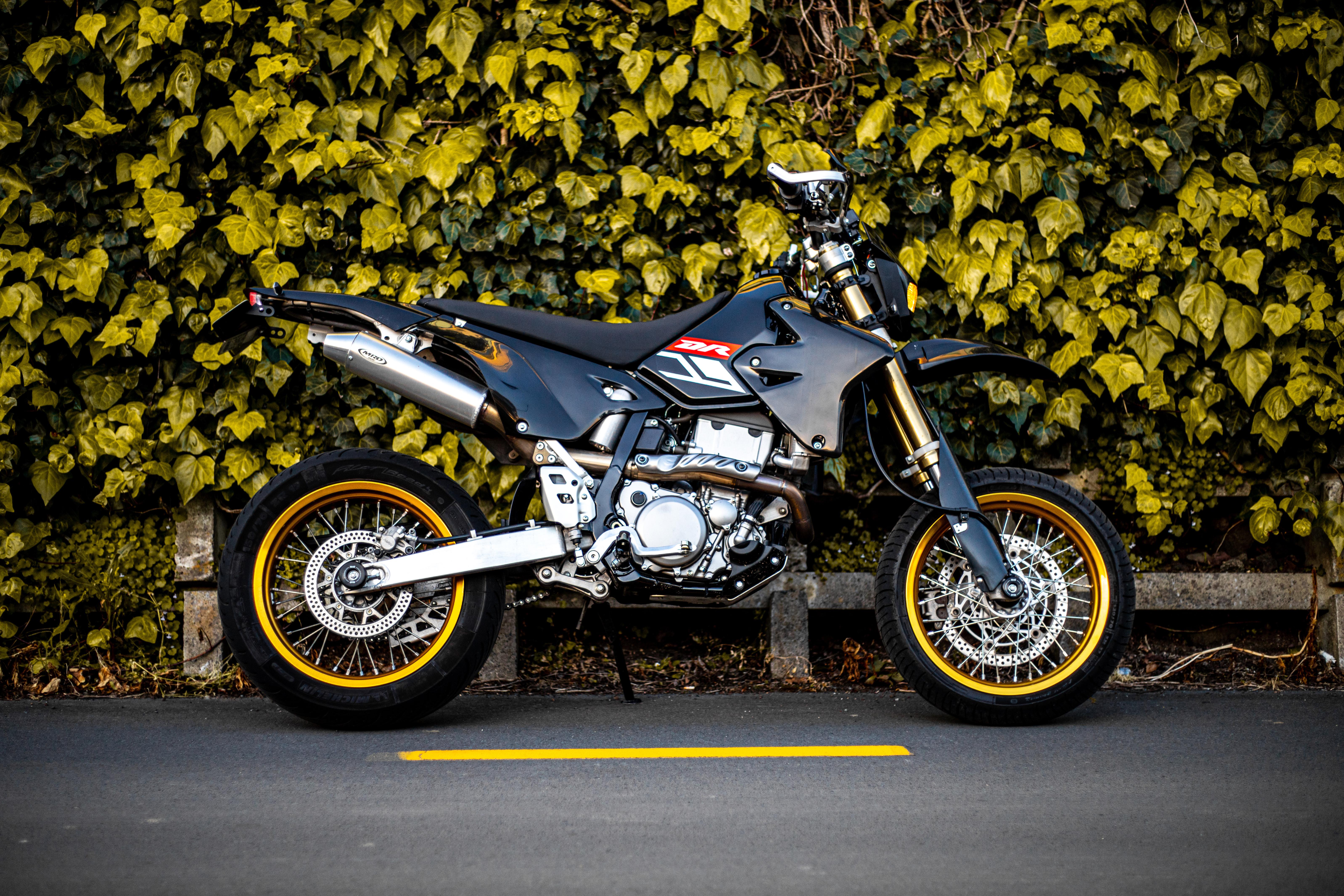 A Drz Slowly Blending Into The Background Supermoto