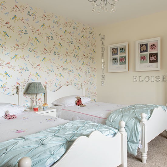 Girls twin bedroom with bird wallpaper Childrens room decorating