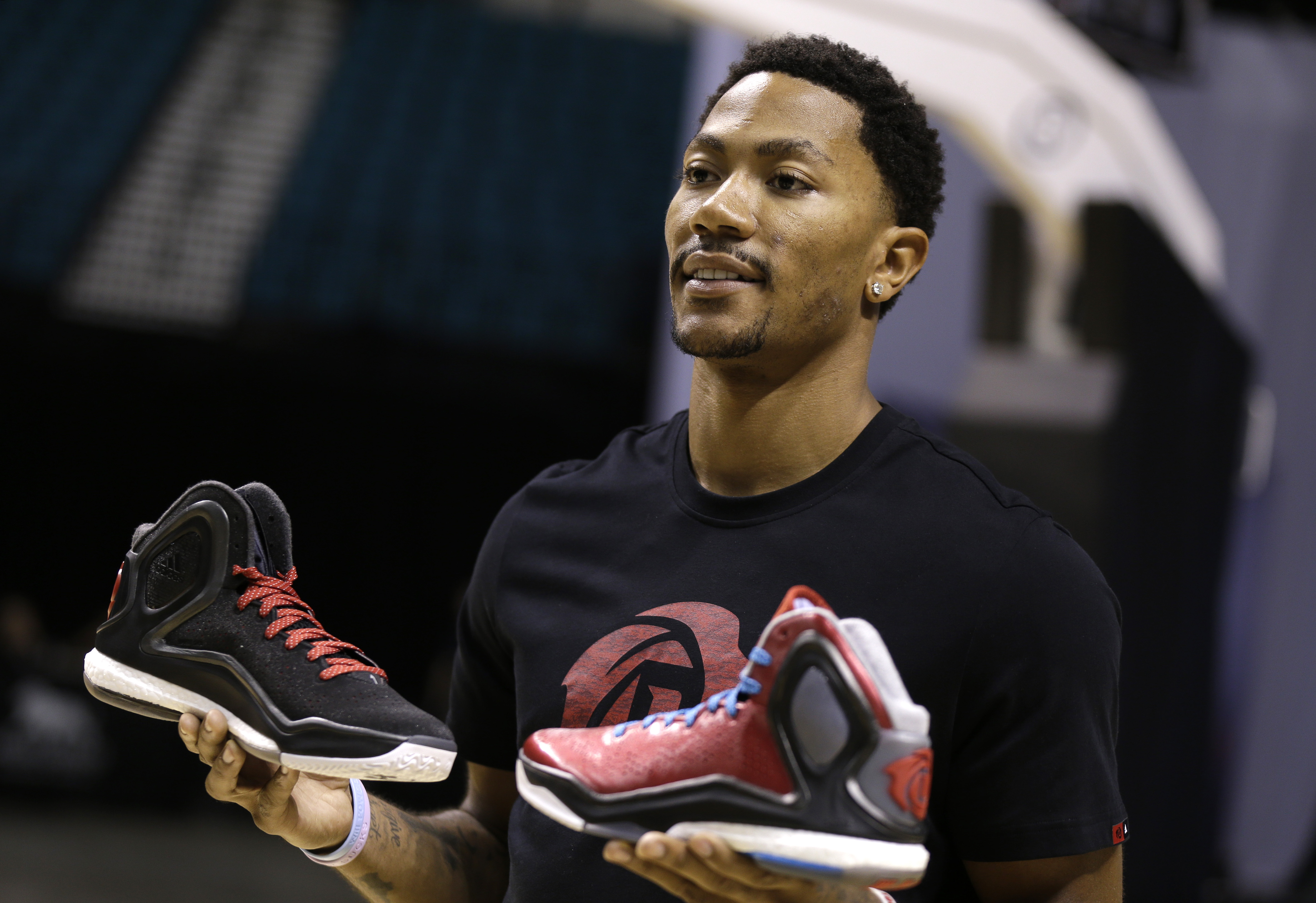 Derrick Rose of the Chicago Bulls shows off the new adidas D Rose