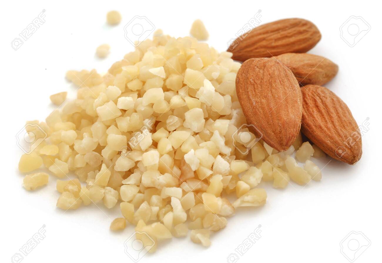 Small Pieces Of Chopped Almonds With Whole Ones Over White