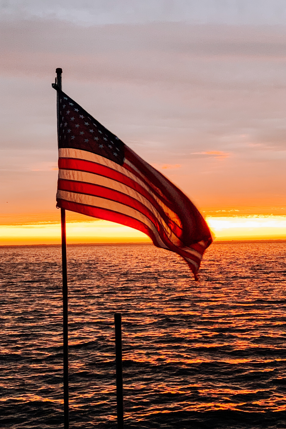 American Flag At Sunset Lake Life