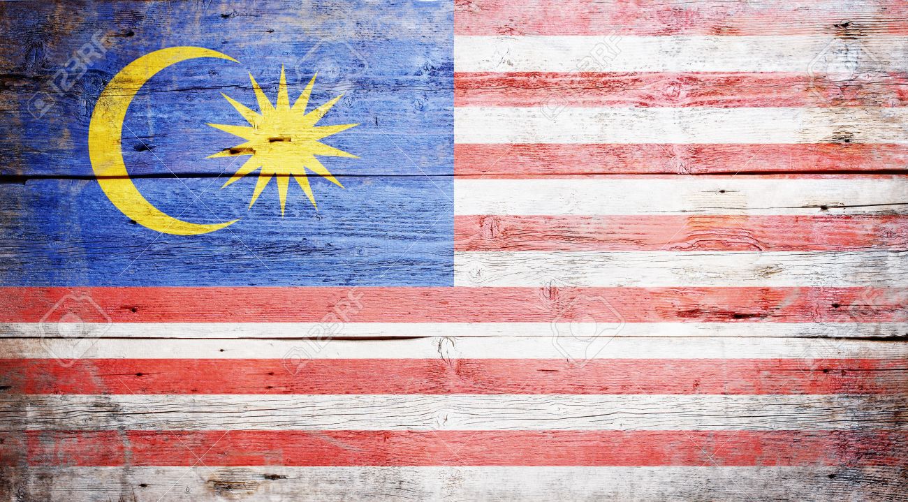 Flag Of Malaysia Painted On Grungy Wood Plank Background Stock