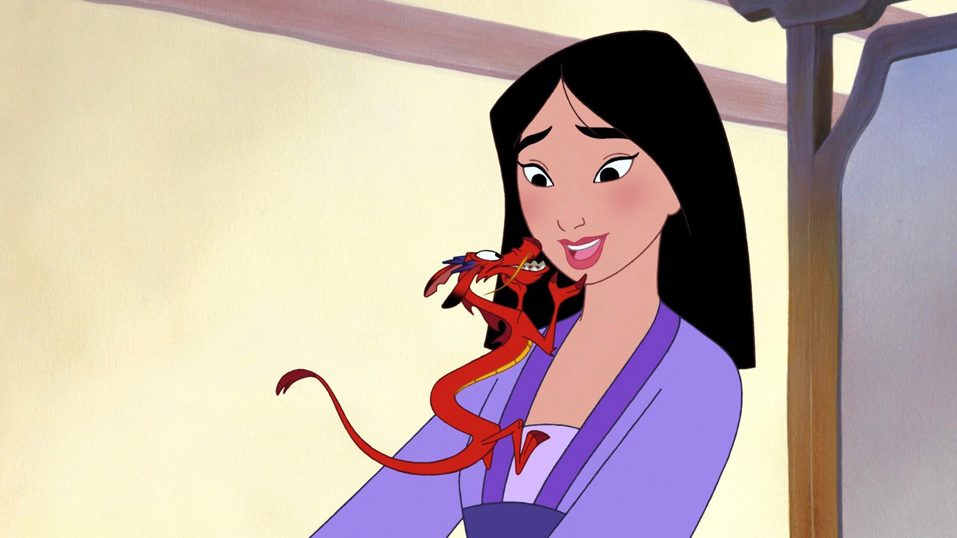 Mulan smiles at her miniature dragon companion, Mushu, in a still from the Disney animated film Mulan