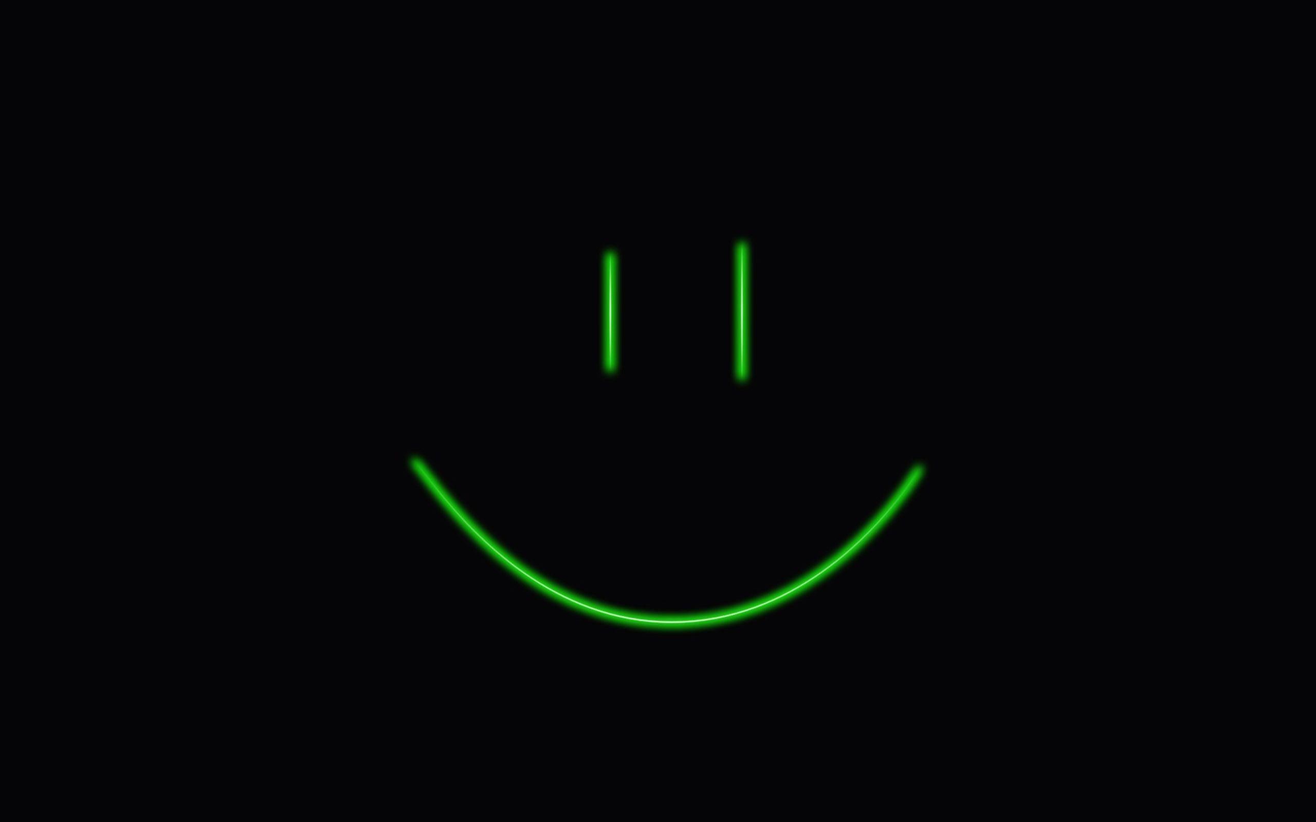Neon Green Smiley Face on a Black Background