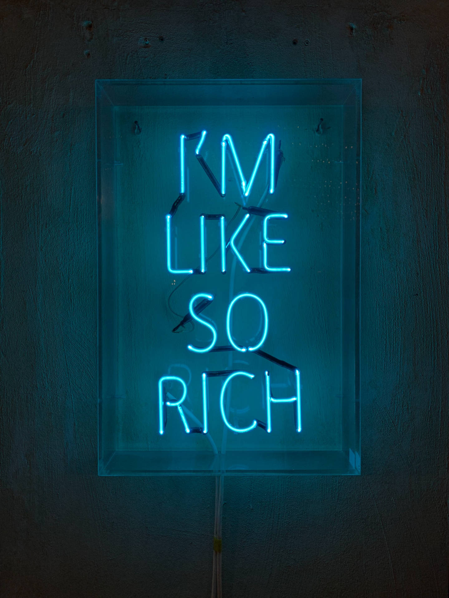 A vibrant neon blue sign displaying the phrase 