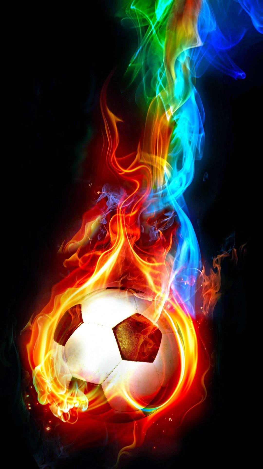 A soccer ball engulfed in vibrant, colorful flames against a black background, creating a dynamic and energetic visual