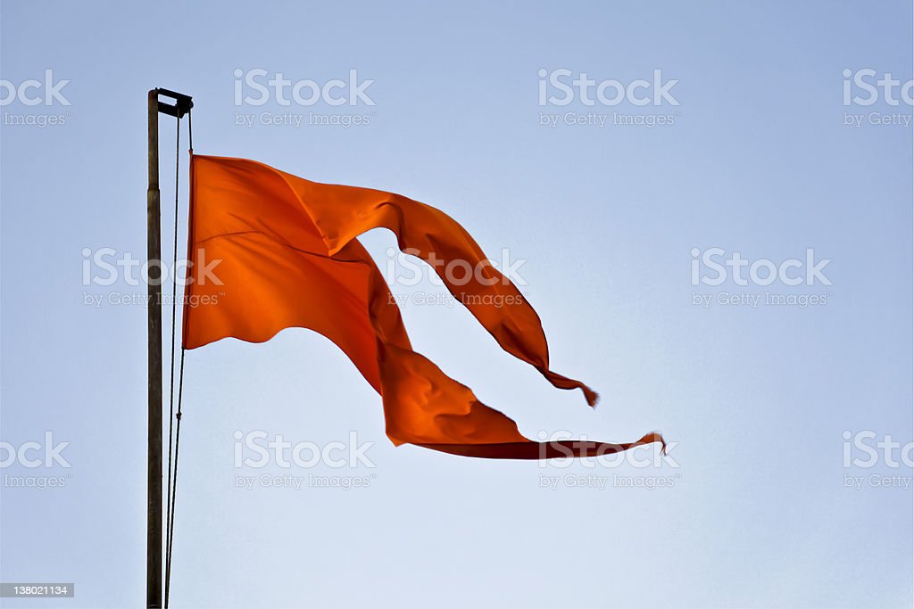 Fluttering In Breeze Hindu Temple Iconic Saffron Flag Stock Photo