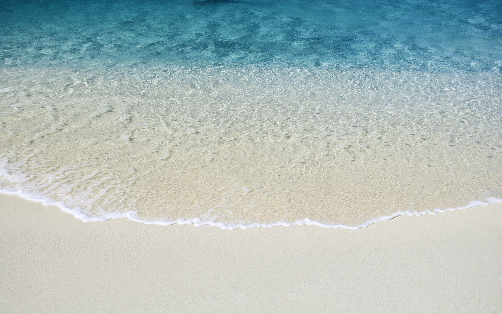 Mac Os X Beach Wallpaper Stock Photos